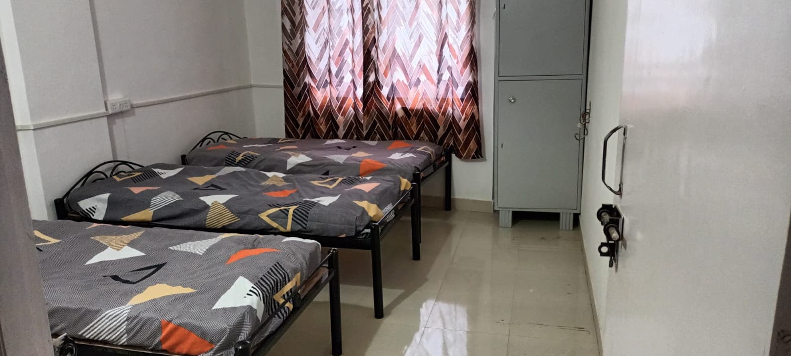 Triple Occupancy with Built-in Lockers - Bhati Boys PG Warje Pune