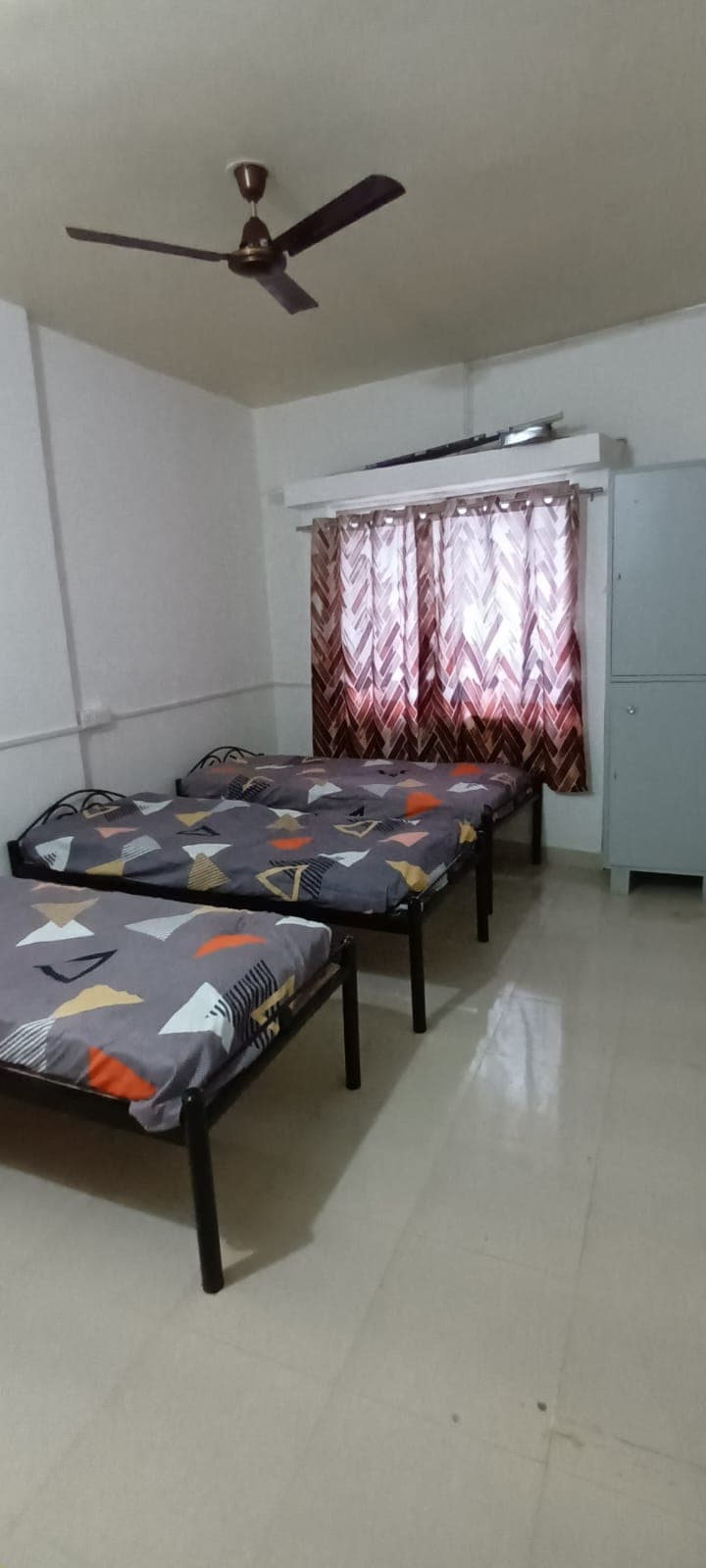 3-Bed Setup with Overhead Storage Loft - Bhati Boys PG Warje Pune