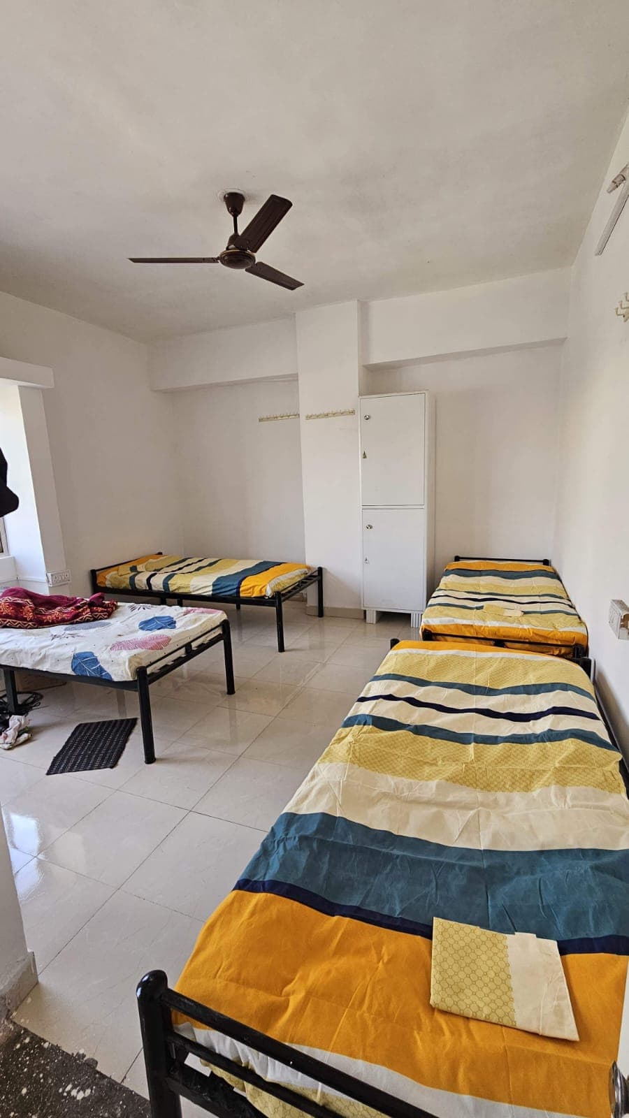 Airy 4-Bed Room with Tall White Cupboards - Bhati Boys PG Warje Pune