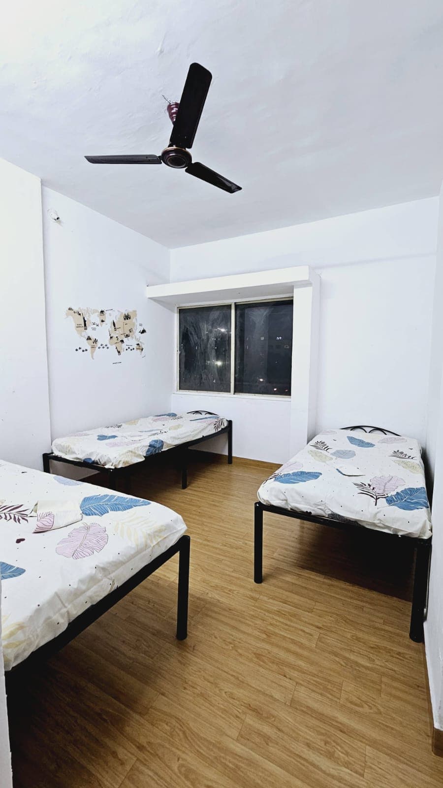 Aesthetic Room with World Map Art - Bhati Boys PG Warje Pune