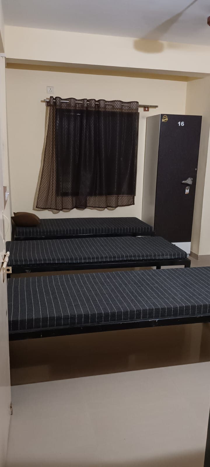 Bed Setup with Numbered Personal Locker 16 - Bhati Boys PG Warje Pune