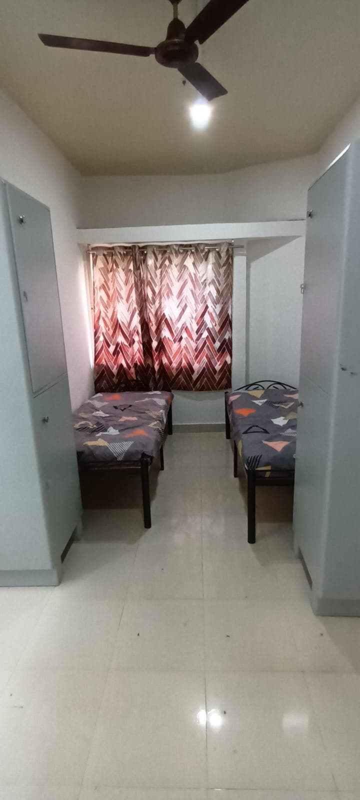 Double Sharing with Dual Tall Lockers - Bhati Boys PG Warje Pune