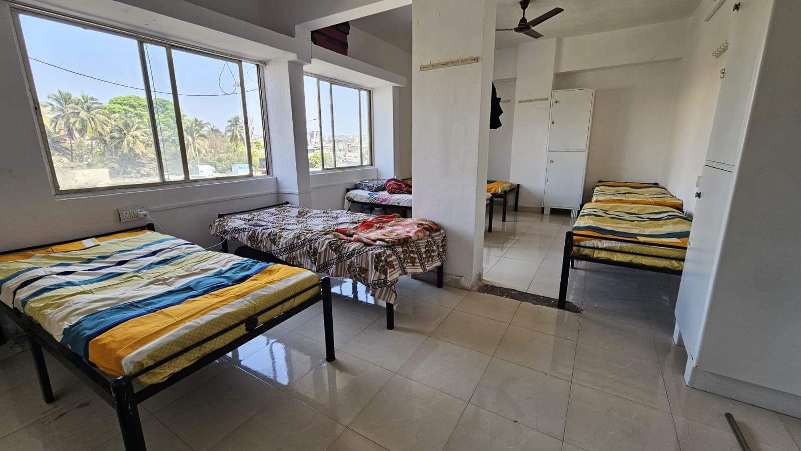 Sunlit Panoramic Multi-Sharing Room - Bhati Boys PG Warje Pune